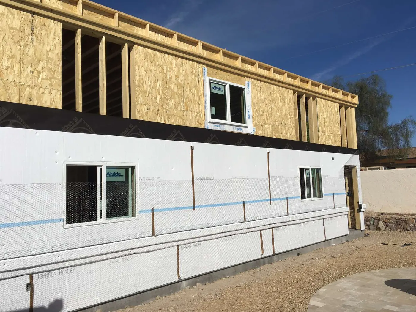 Exterior wall sheathing and window openings during a K&R build