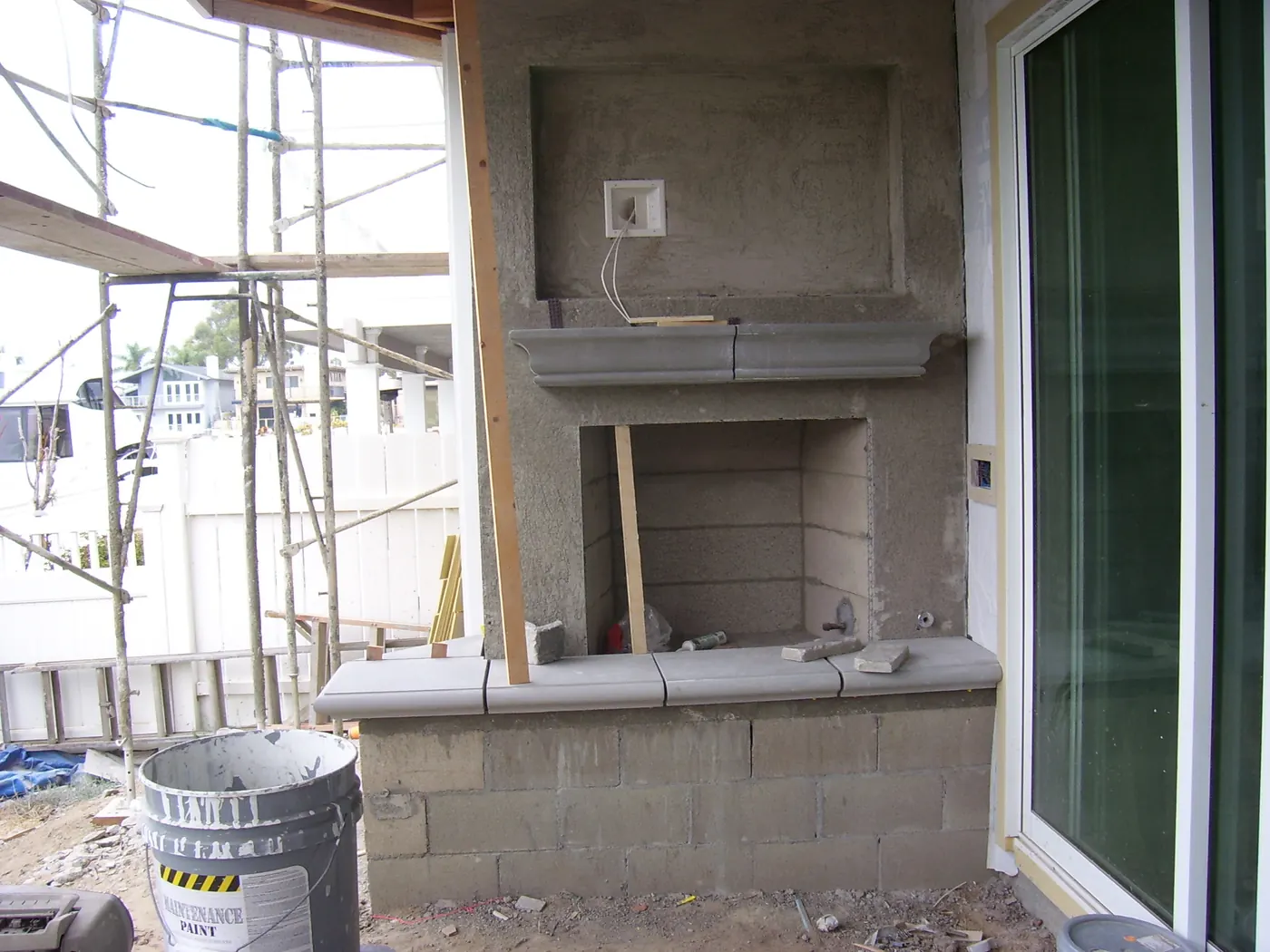 Fireplace feature wall under construction in the Huntington Beach custom home