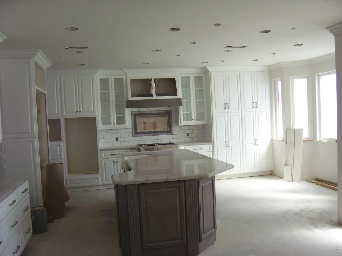 Bright kitchen and island inside the Huntington Beach custom home